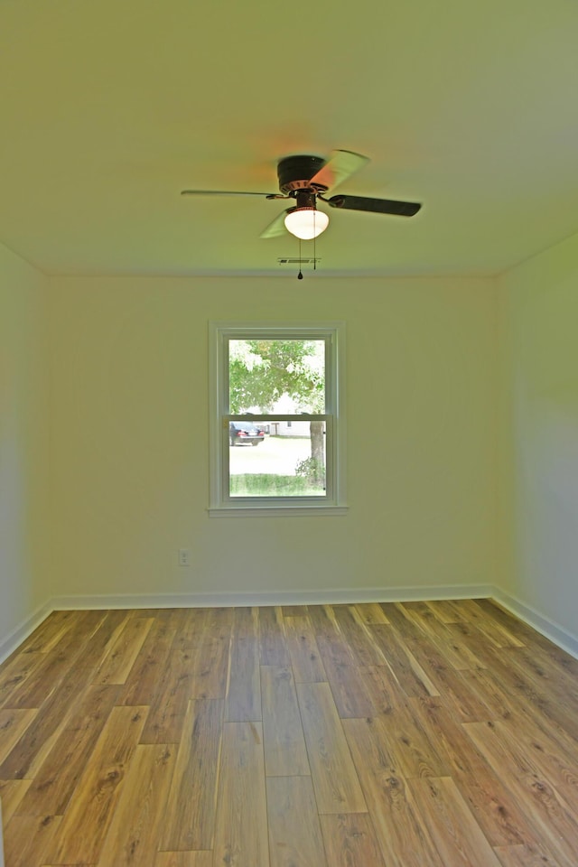 1101 Stuart Dr, Moncks Corner, SC 29461 - unfurnished room featuring wood finished floors, baseboards, and ceiling fan