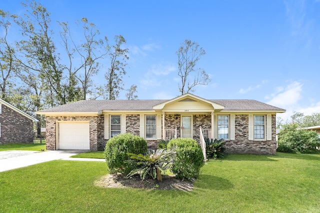 ranch-style home featuring a front lawn and a garage