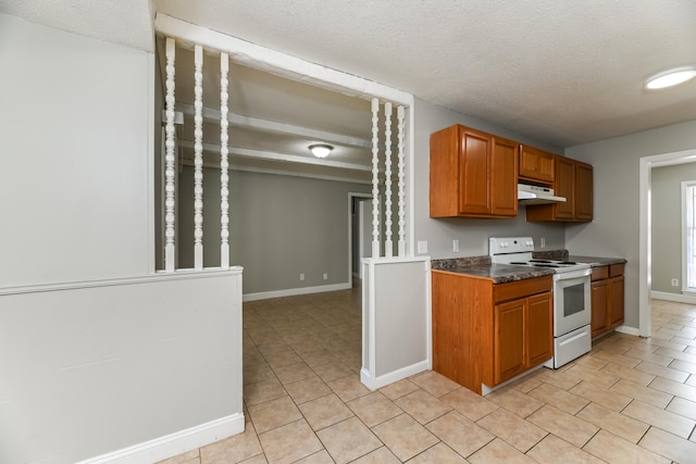 kitchen featuring white range with electric cooktop and a textured ceiling