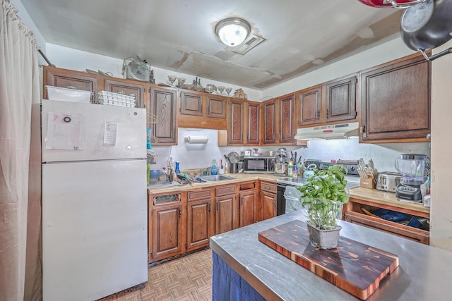 kitchen featuring sink, electric range, light parquet floors, and white refrigerator