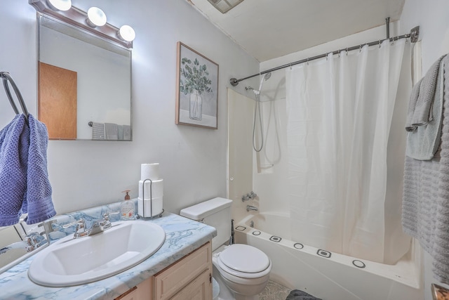 full bathroom featuring vanity, shower / tub combo, and toilet