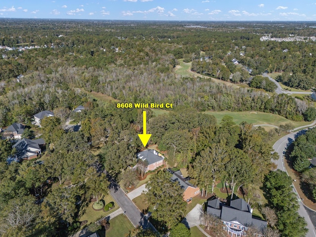 aerial view featuring a forest view