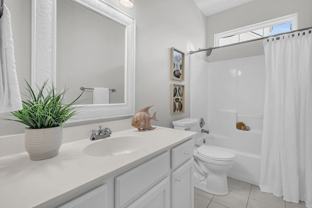 full bath with toilet, shower / bath combo with shower curtain, vanity, and tile patterned floors