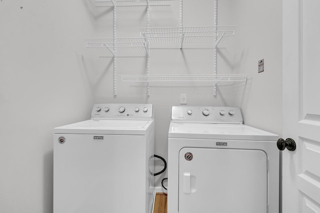 laundry area with laundry area and washer and dryer