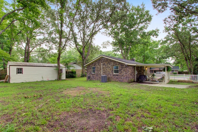 10 Teaneck Rd, Goose Creek, SC 29445 - view of yard with an attached carport and an outdoor structure