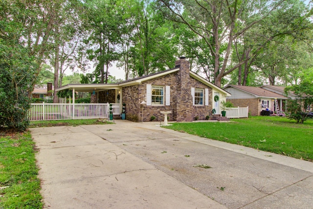 10 Teaneck Rd, Goose Creek, SC 29445 - ranch-style house featuring brick siding, a chimney, and driveway