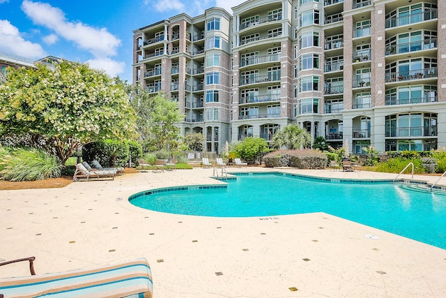 view of swimming pool featuring a patio