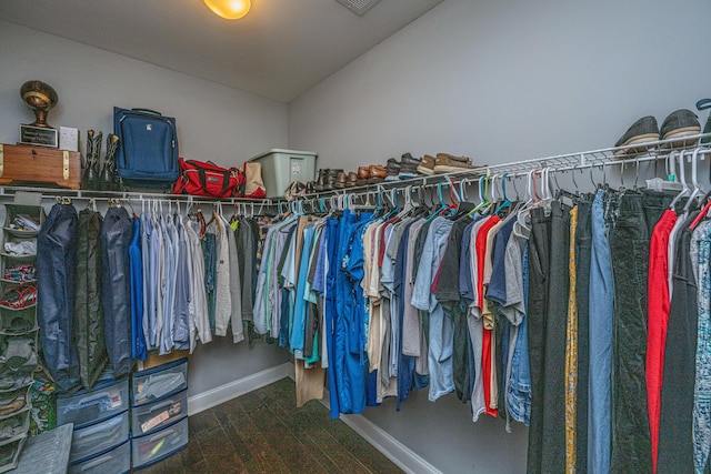 spacious closet featuring wood finished floors