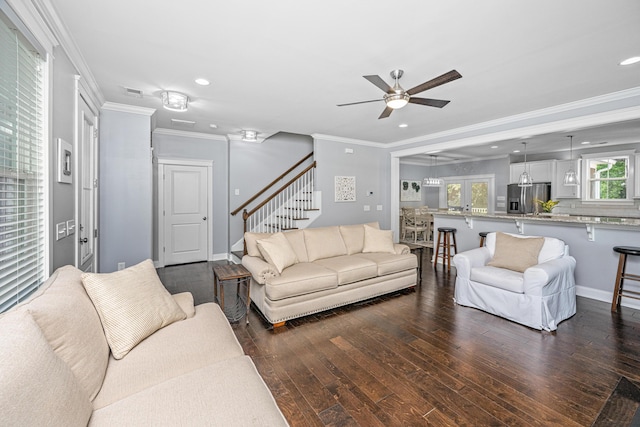 living room with dark wood-style floors, stairway, a ceiling fan, recessed lighting, and ornamental molding
