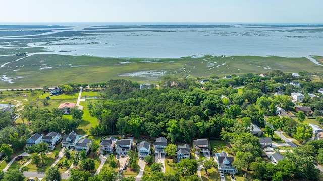 view of property location with a large body of water and nearby suburban area