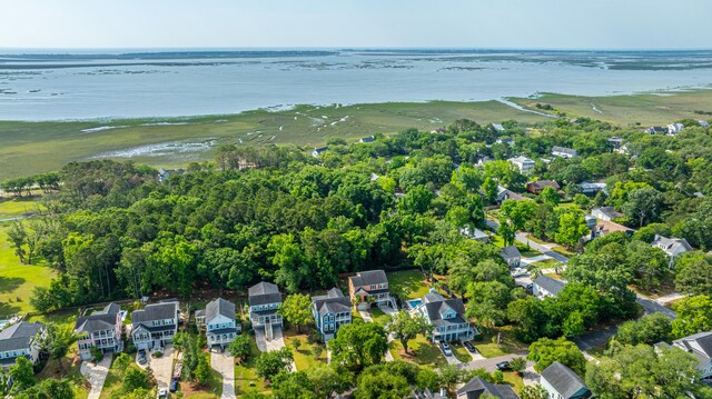 aerial view of residential area with a nearby body of water