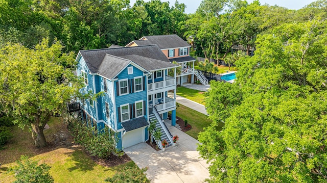 view from above of property with a forest