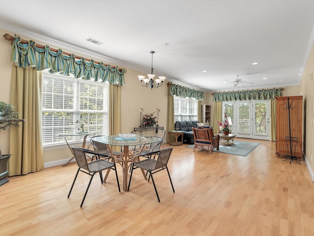 dining room with light hardwood / wood-style floors and plenty of natural light