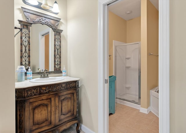 bathroom with vanity, walk in shower, and tile patterned flooring