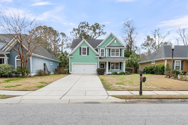 craftsman house featuring concrete driveway, an attached garage, and a front lawn