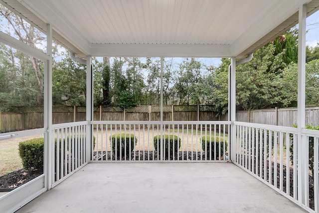 unfurnished sunroom featuring plenty of natural light