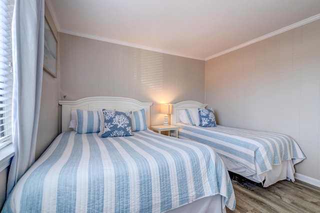 1400 Ocean Blvd Unit 106B, Isle Of Palms, SC 29451 - bedroom with wood finished floors and ornamental molding