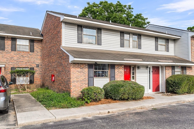 2362 Parsonage Rd Unit 2H, Charleston, SC 29414 - view of front of home featuring brick siding and roof with shingles