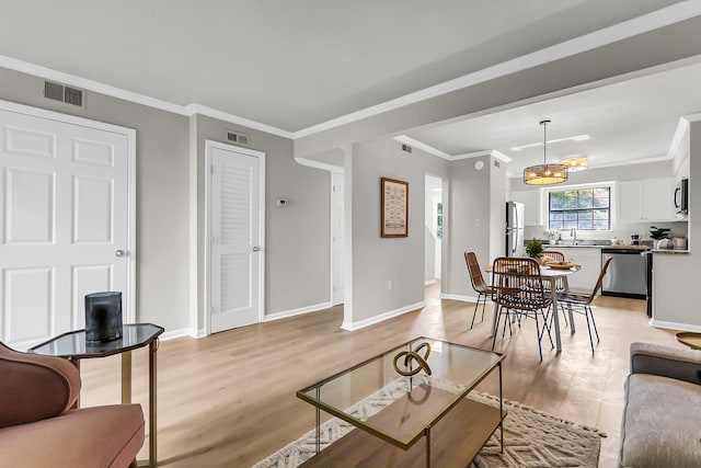 2362 Parsonage Rd Unit 2H, Charleston, SC 29414 - living area with light wood-style flooring and crown molding