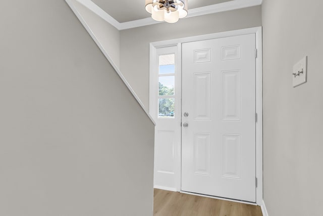 2362 Parsonage Rd Unit 2H, Charleston, SC 29414 - foyer with a chandelier, light wood-style flooring, and crown molding