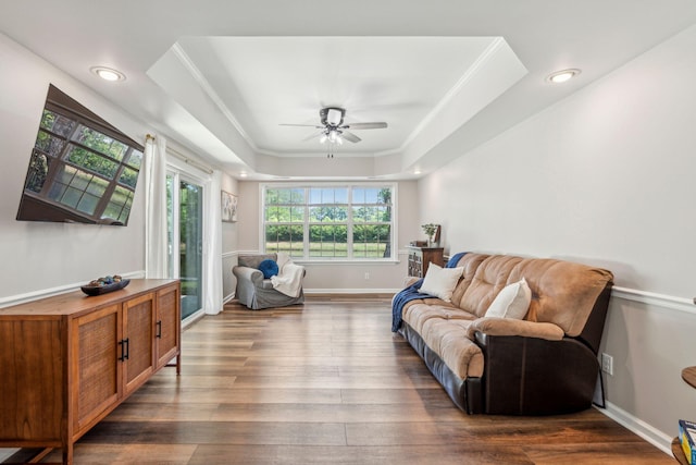 1027 Wayfarer Ln, Charleston, SC 29412 - living room with a ceiling fan, dark wood-style flooring, a raised ceiling, recessed lighting, and baseboards