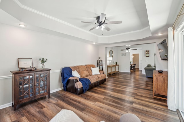 1027 Wayfarer Ln, Charleston, SC 29412 - living area with a tray ceiling, a ceiling fan, wood finished floors, crown molding, and baseboards