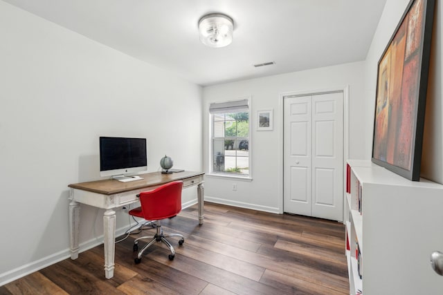 1027 Wayfarer Ln, Charleston, SC 29412 - home office with dark wood-style flooring and baseboards