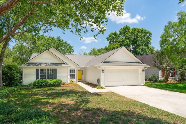 1027 Wayfarer Ln, Charleston, SC 29412 - ranch-style house featuring an attached garage, concrete driveway, a front yard, and roof with shingles