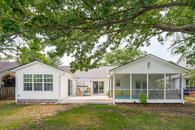 1027 Wayfarer Ln, Charleston, SC 29412 - rear view of property with a ceiling fan, a wooden deck, a shingled roof, and a sunroom
