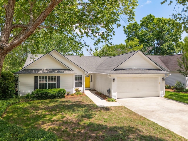 1027 Wayfarer Ln, Charleston, SC 29412 - ranch-style home featuring a garage, concrete driveway, a front lawn, and roof with shingles