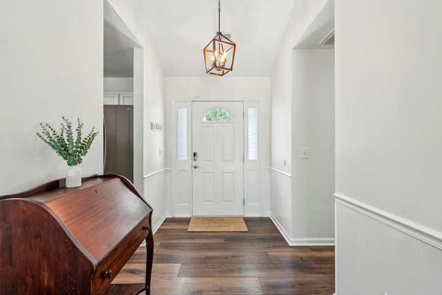 1027 Wayfarer Ln, Charleston, SC 29412 - foyer with a chandelier, dark wood-style floors, and a wainscoted wall