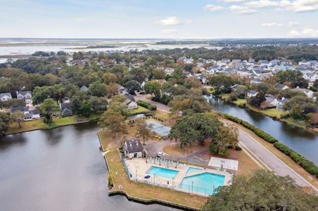 1027 Wayfarer Ln, Charleston, SC 29412 - aerial view of property and surrounding area with a nearby body of water, a pool area, and nearby suburban area
