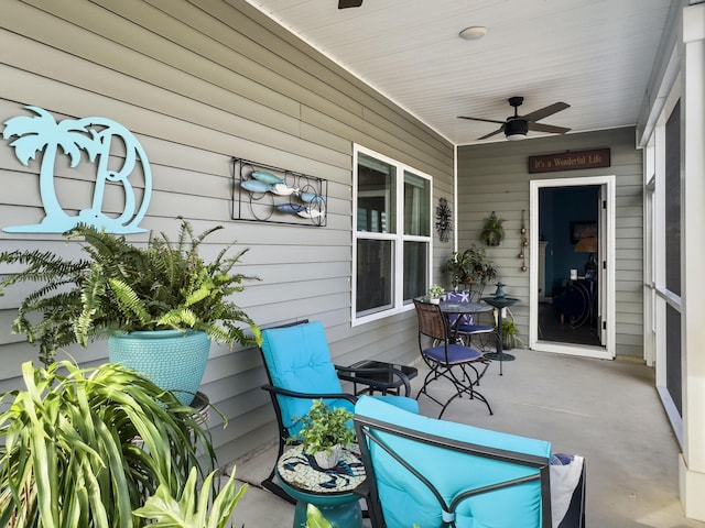 view of patio / terrace with ceiling fan and a porch