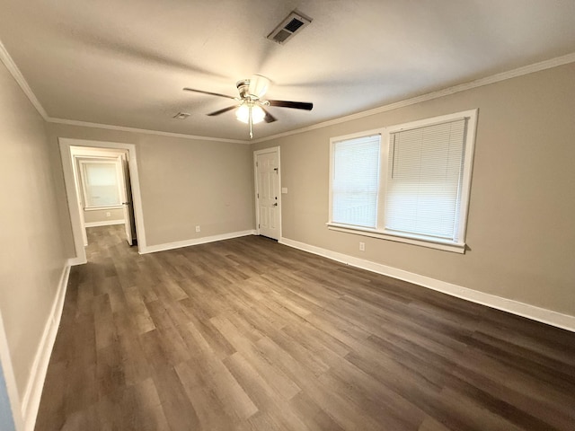 307 Mill St, Walterboro, SC 29488 - interior space featuring a ceiling fan, baseboards, ornamental molding, dark wood finished floors, and visible vents