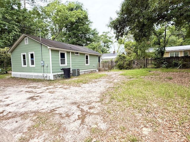 307 Mill St, Walterboro, SC 29488 - rear view of house featuring central AC unit and fence
