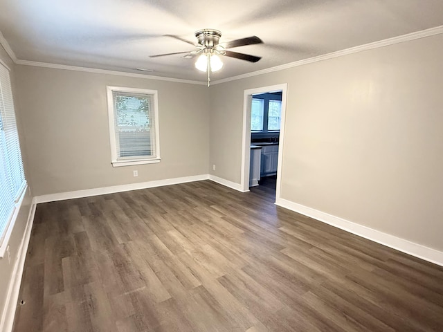 307 Mill St, Walterboro, SC 29488 - empty room with dark wood finished floors, a wealth of natural light, baseboards, and a ceiling fan