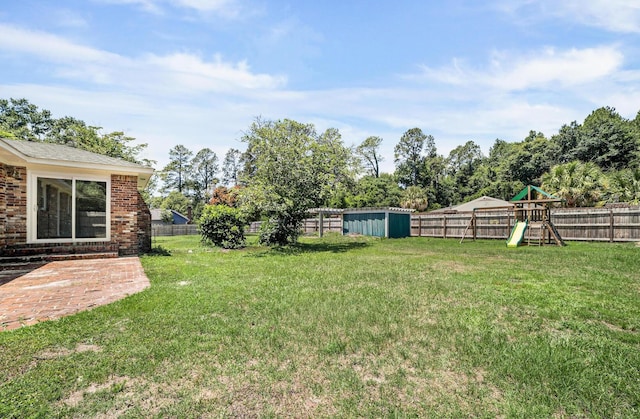 view of yard with a playground