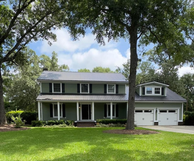 1211 Dennis Blvd, Moncks Corner, SC 29461 - view of front of house featuring driveway, covered porch, a front lawn, and a metal roof