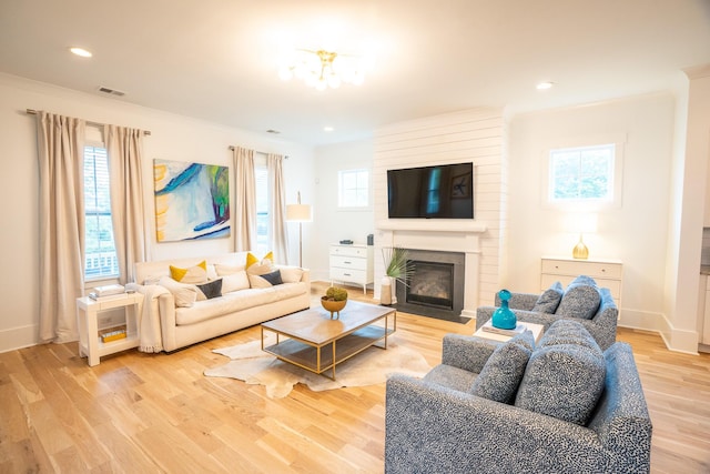 3707 Gambrill Ln, Mount Pleasant, SC 29466 - living area featuring light wood-style floors, a fireplace, plenty of natural light, baseboards, and recessed lighting