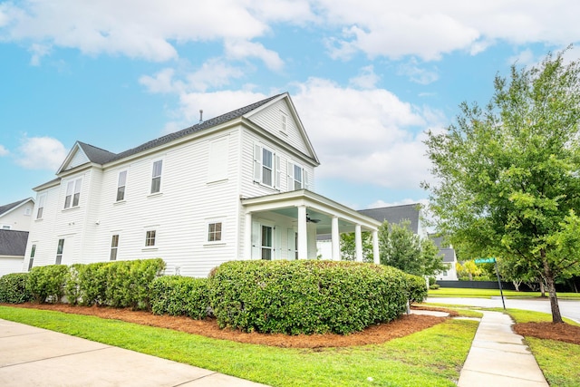 3707 Gambrill Ln, Mount Pleasant, SC 29466 - view of side of home featuring a ceiling fan, a yard, and a porch