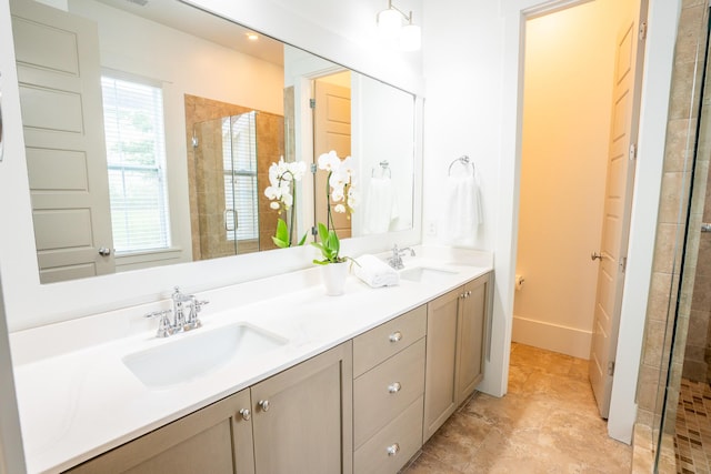 3707 Gambrill Ln, Mount Pleasant, SC 29466 - bathroom with a stall shower, double vanity, and baseboards