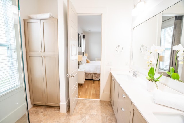 3707 Gambrill Ln, Mount Pleasant, SC 29466 - ensuite bathroom with double vanity, healthy amount of natural light, and baseboards