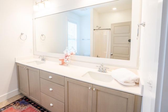 3707 Gambrill Ln, Mount Pleasant, SC 29466 - full bathroom with double vanity, baseboards, curtained shower, and toilet