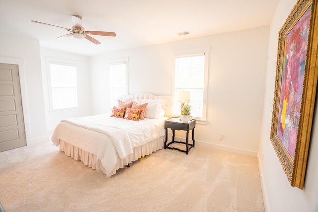 3707 Gambrill Ln, Mount Pleasant, SC 29466 - bedroom with light colored carpet, a ceiling fan, and baseboards