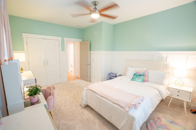 3707 Gambrill Ln, Mount Pleasant, SC 29466 - bedroom with a wainscoted wall, carpet, a closet, ceiling fan, and a decorative wall