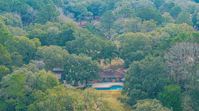 drone / aerial view with a view of trees