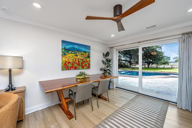 home office featuring baseboards, light wood finished floors, recessed lighting, and crown molding