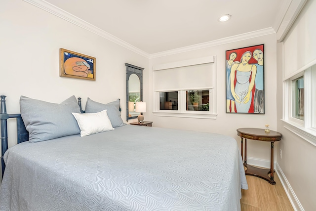 bedroom featuring recessed lighting, baseboards, crown molding, and wood finished floors