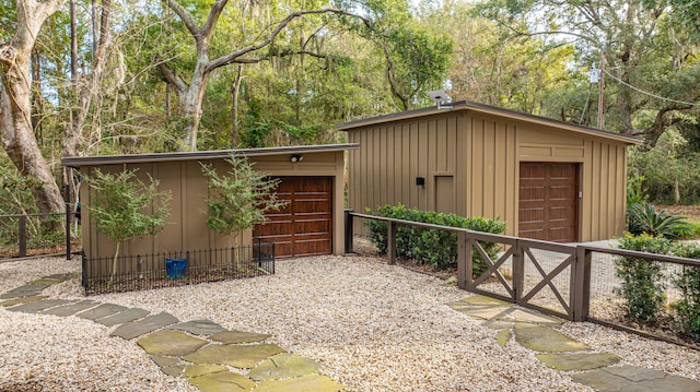 detached garage with fence