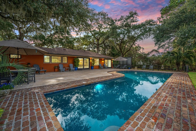 pool with a patio